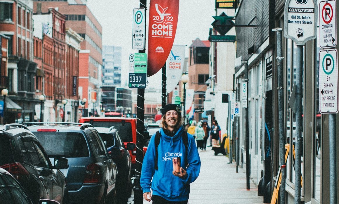 man walking in St. John's Newfoundland, water street