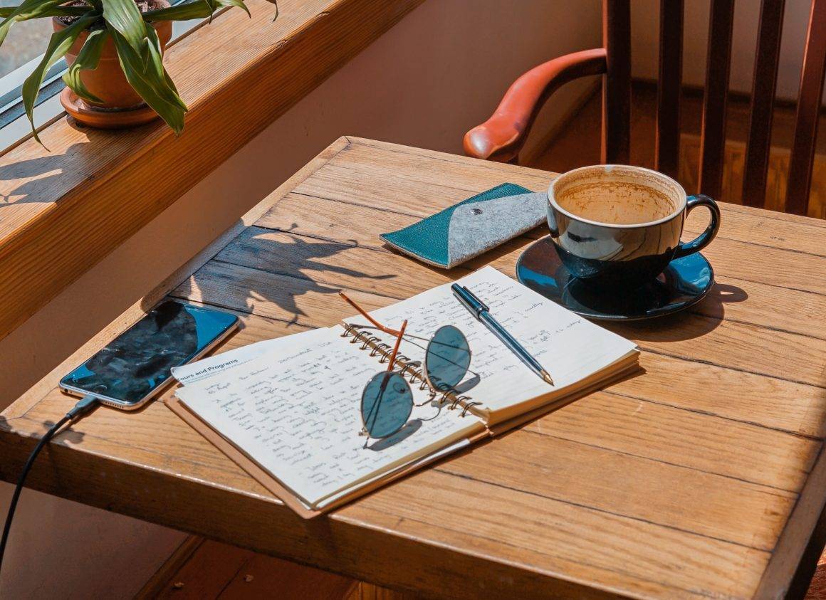 A notebook opened on top of a table.